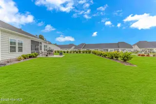 8960 Smithfield Drive NW, Calabash, NC 28467 – photo 4: Exterior back