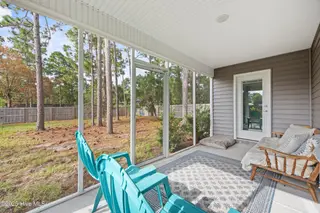 1138 Fifty Lakes Drive, Southport, NC 28461 – photo 20: Screened Porch (4)