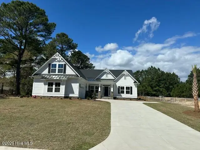 7504 Wallace Place SW 21, Sunset Beach, NC 28468 – photo 1 of 16: Gibbons Pic