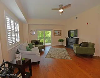 3100 Marsh Grove Lane # 3201, Southport, NC 28461 — 2-bedroom condo in The Preserve at Oak Island, Southport, NC, photo 12 of 41: living room