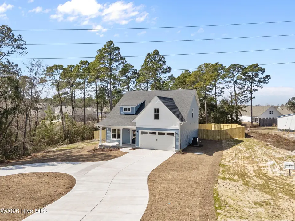2361 Sunset Harbor Road SE, Bolivia, NC 28422 – photo 1 of 45: 2-web-or-mls-DJI_20260304131744_0419_D