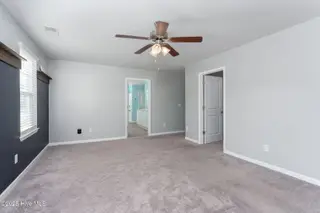 67 Fresh Air Drive, Hampstead, NC 28443 – photo 22: Large primary bedroom