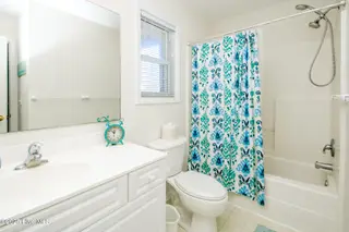 1131 S Shore Drive, Surf City, NC 28445 – photo 17: Hall Bath with Tub
