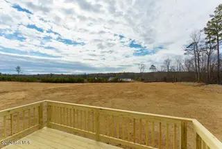 Lot 26 River Meadow Court, Spring Hope, NC 27882 – photo 10: 11 - Back yard Medium