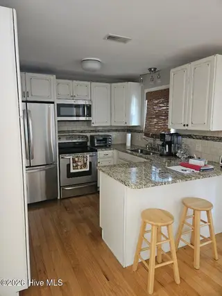 804 Fayetteville Avenue, Carolina Beach, NC 28428 – photo 12: lola Kitchen2