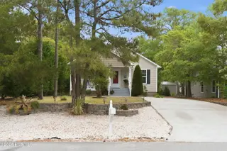 168 NE 3rd Street, Oak Island, NC 28465 – photo 2: 40-web-or-mls-dsc09808_edit