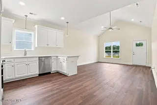 3229 Dolostone Court SW, Wilson, NC 27893 – photo 13: Kitchen to Family Room