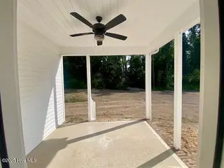 213 Willowbrook Drive, Pikeville, NC 27863 – photo 9: rear covered porch