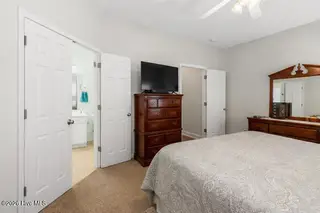 221 Palomino Lane, Swansboro, NC 28584 – photo 17: palomino_decluttered_bedroom_2