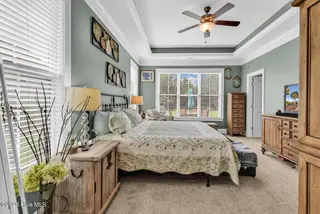 3032 Eno Lane, Leland, NC 28451 — 4-bedroom home in Brunswick Forest, Leland, NC, photo 17 of 55: Master Bedroom