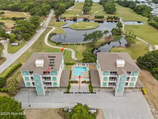 112 Oakleaf Drive 1003-A, Pine Knoll Shores, NC 28512 – photo 3: Shutter on the Sound Complex