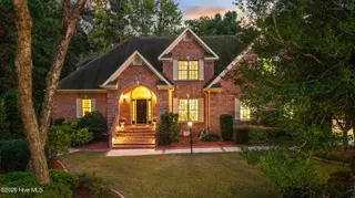8816 Sawmill Creek Lane, Wilmington, NC 28411 — 5-bedroom home in Porters Neck Plantation, Wilmington, NC, photo 1 of 66: 3_dji_20260925192653_0101_d