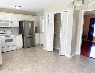 4901 N Hampton Drive SE, Southport, NC 28461 – photo 12: 4901 N Hampton New Paint 1
