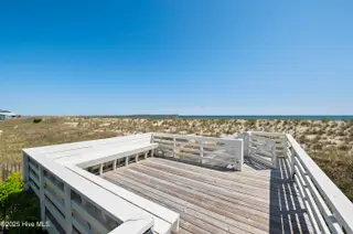1123 E Beach Drive, Oak Island, NC 28465 – photo 8: mls-RIC_4630
