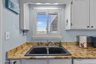 1000 Caswell Beach Road Apt. 806, Oak Island, NC 28465 — 2-bedroom condo in Oak Island Bch Villa, Oak Island, NC, photo 14 of 56: Double Sink