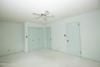 119 Pine Lake Drive, Whispering Pines, NC 28327 – photo 7: Master Bedroom