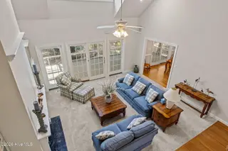 121 Oakleaf Drive, Pine Knoll Shores, NC 28512 – photo 22: Living from stairs
