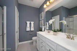 345 Eagle Claw Drive 4040, Carolina Shores, NC 28467 – photo 10: Compton - Owner's Bath