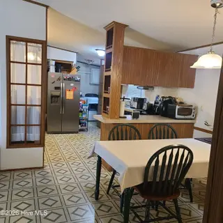 107 Eagle Ridge Drive, Dudley, NC 28333 — 4-bedroom manufactured home in Eagle Ridge, Dudley, NC, photo 7 of 17: Kitchen/Dining
