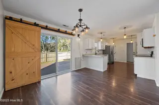 122 Tanbark Drive, Jacksonville, NC 28546 — 3-bedroom home in Aragona Village, Jacksonville, NC, photo 14 of 53: Dining Room