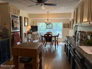 552 Woodfield Road, Whiteville, NC 28472 – photo 13: Kitchen from Dining
