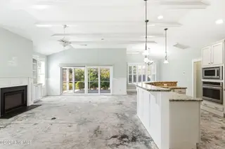 1454 Dunes Boulevard SW, Ocean Isle Beach, NC 28469 – photo 6: Vaulted ceilings w/decorative beams