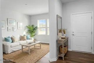 273 Ocean Pointe Boulevard SE 1801, Bolivia, NC 28422 – photo 6: AI GENERATED FRONT ROOM-HALLWAY