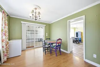 141 Crystal Road, Southport, NC 28461 — 3-bedroom home, Southport, NC, photo 9 of 40: 141 Crystal Rd dining