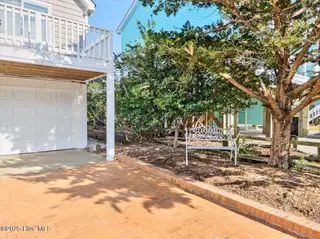 258 Brunswick Avenue W # B, Holden Beach, NC 28462 – photo 6: Garage and Brick Driveway