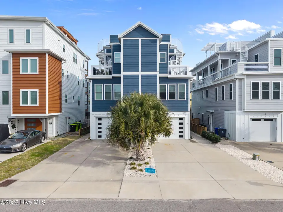1209 Snapper Lane Unit 2, Carolina Beach, NC 28428 – photo 1 of 65: 1-web-or-mls-DJI_20260129144519_0518_D