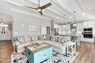 1353 Dunes Boulevard SW, Ocean Isle Beach, NC 28469 – photo 10: Vaulted ceilings/decorative beams