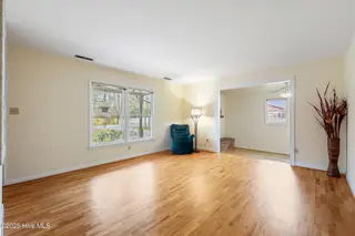 4641 Masonboro Loop Road, Wilmington, NC 28409 – photo 13: Living room Beautiful Hardwoods
