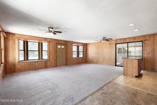 1021 Filmore Street, Southport, NC 28461 — 3-bedroom home in Boiling Spring Lakes, Southport, NC, photo 9 of 77: Living / dining