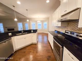 412 Moss Springs Drive, Peletier, NC 28584 – photo 8: kitchen & dining area
