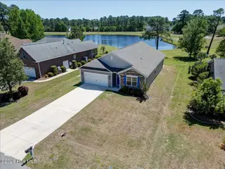 2021 Caracara Drive, New Bern, NC 28560 – photo 2: 2021 Caracara Dr. with pond view