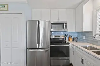 704 Carolina Beach Avenue N 12c, Carolina Beach, NC 28428 – photo 9: Photo Feb 06 2026, 12 00 23