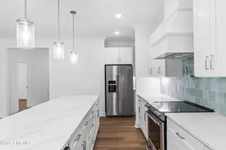 320 NE 50th Street, Oak Island, NC 28465 – photo 16: 013_320_ne-13_192