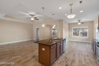 123 Bellwood Circle, Sunset Beach, NC 28468 – photo 11: Kitchen to LR