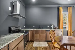 223 S 5th Avenue, Wilmington, NC 28401 — 6-bedroom home in Historic District, Wilmington, NC, photo 18 of 48: Unit A Kitchen
