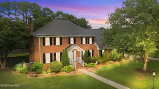 105 Christina Drive, Greenville, NC 27858 – photo 2: Dusk-to-Dawn Primary