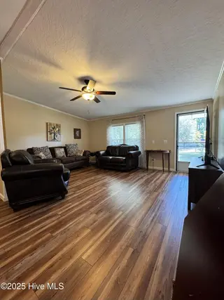 211 Beachwood Drive NW, Calabash, NC 28467 — 3-bedroom manufactured home in Ocean Forest, Calabash, NC, photo 18 of 75: living room 3