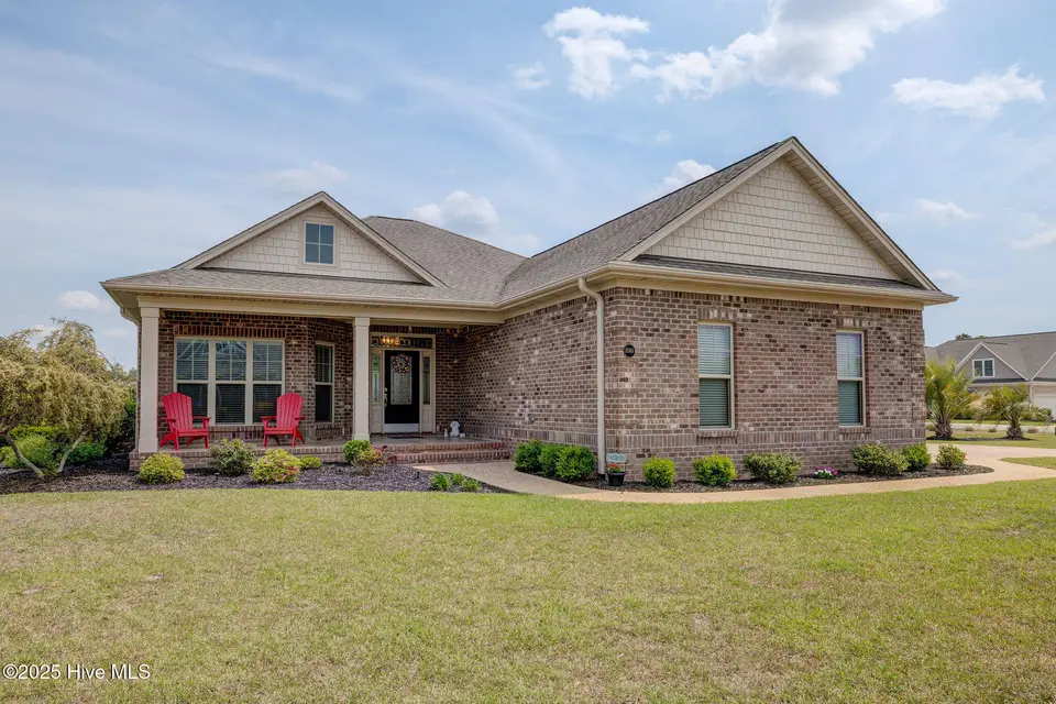 8560 Oak Abbey Trail NE, Leland, NC 28451 — 2-bedroom home in Compass Pointe, Leland, NC, photo 1 of 52: Front