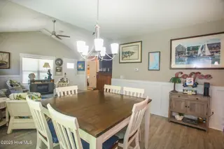 218 NE 67th Street, Oak Island, NC 28465 – photo 9: living room din 1