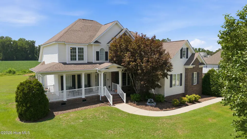 1296 Windbrooke Drive, Grimesland, NC 27837 – photo 1 of 47: 4-web-or-mls-DJI_20260731135922_0834_D