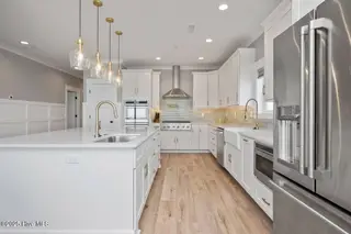 2918 E Beach Drive, Oak Island, NC 28465 – photo 20: Tan and No Plan pict13
