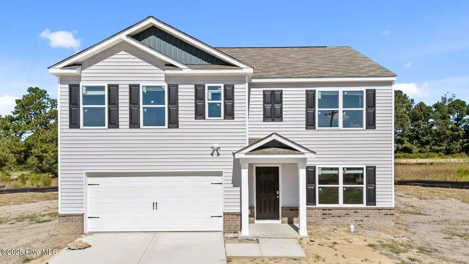 202 Wood Street, La Grange, NC 28551 – photo 1 of 47: 1-custom-DJI_20250903110107_0895_D