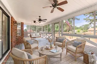 1813 Oberry Center Road, Goldsboro, NC 27530 – photo 5: Screened in porch-virtually staged