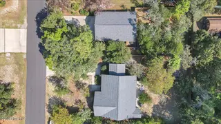 224 NE 51st Street, Oak Island, NC 28465 – photo 3: 55-Final Drone 224 NE 51st St OKI-RJREM-