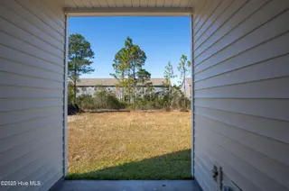 222 Sandpiper Place, Holly Ridge, NC 28445 – photo 7: 222 Sand Piper - Exterior - Edited