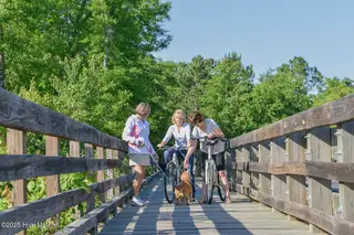3022 82 W Timber Crest Drive NE, Leland, NC 28451 — lot in Compass Pointe, Leland, NC, photo 15 of 20: 13 Biking